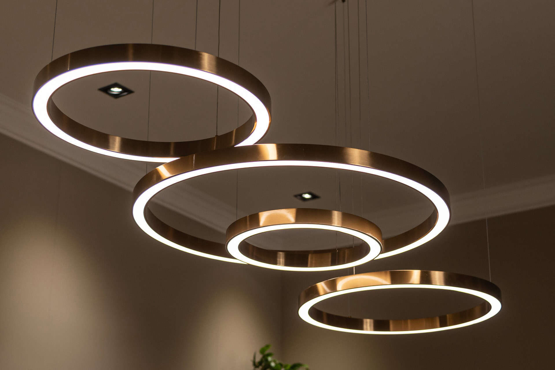 Elegant modern ceiling lights in gold round LED bulbs, perfect for a luxurious interior.
