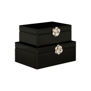 Elegant black jewelry box with flower buds, perfect for luxury home décor.
