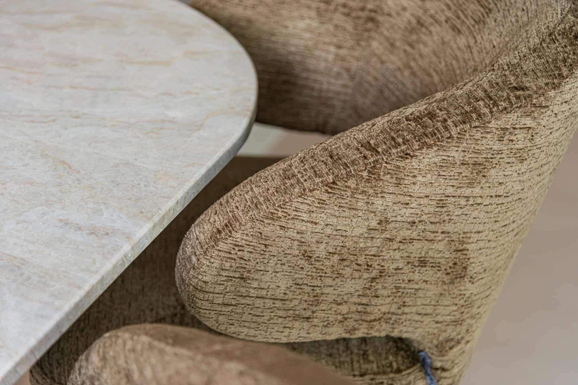 Textured finish, beige indoor chair, comfortable lounge dining chair, modern design, durable finish.