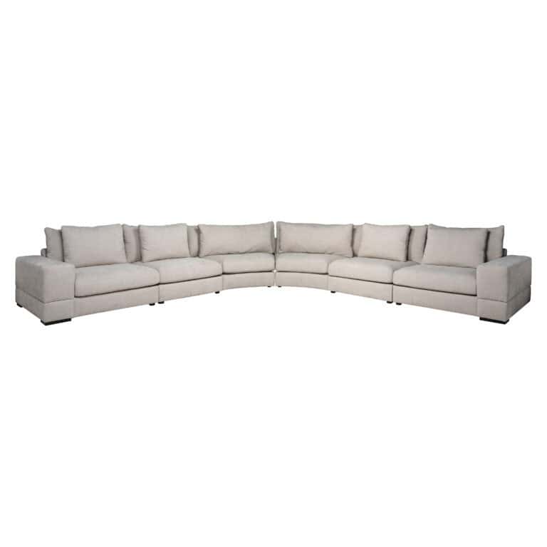 Luxury modular sofa with beige upholstery and comfortable cushions.