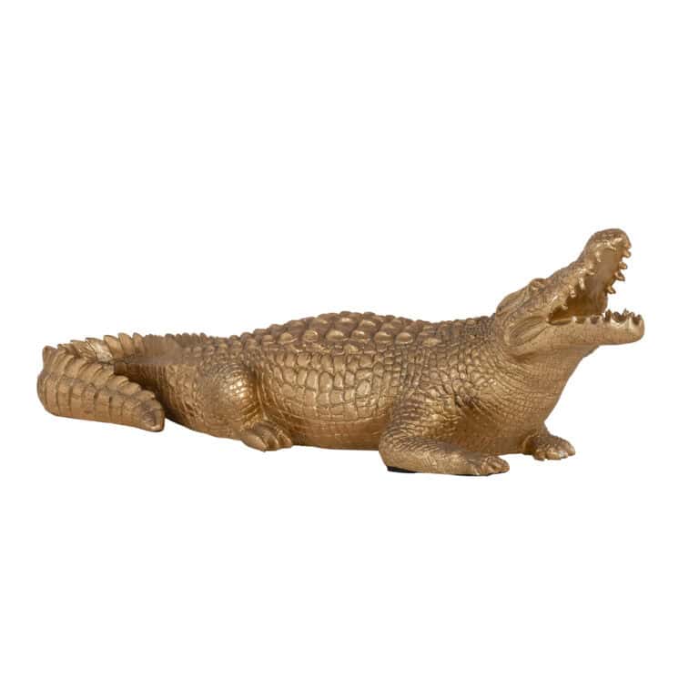 Figurine de crocodile en matériau décoratif doré, idéale pour la décoration d'intérieur et comme élément de design.