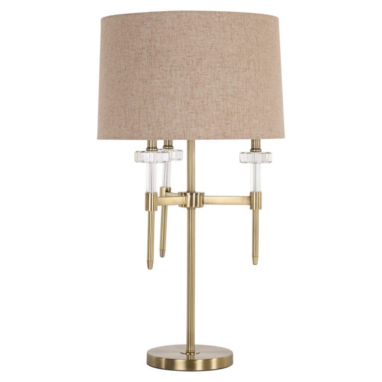 Luxe tafellamp met goudafwerking en beige lampenkap, perfect voor modern interieur.
