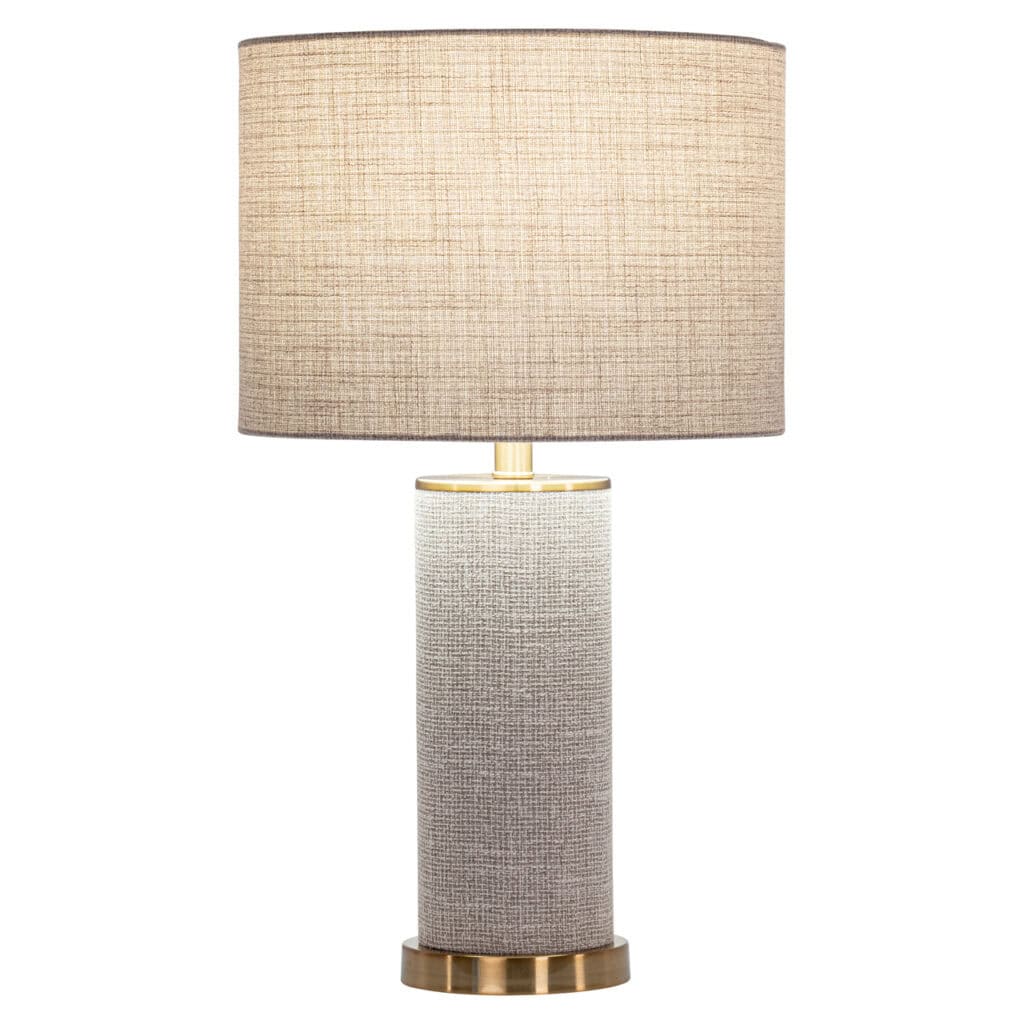 Moderne tafellamp met stoffen kap en goudaccent, perfect voor interieurdecoratie.