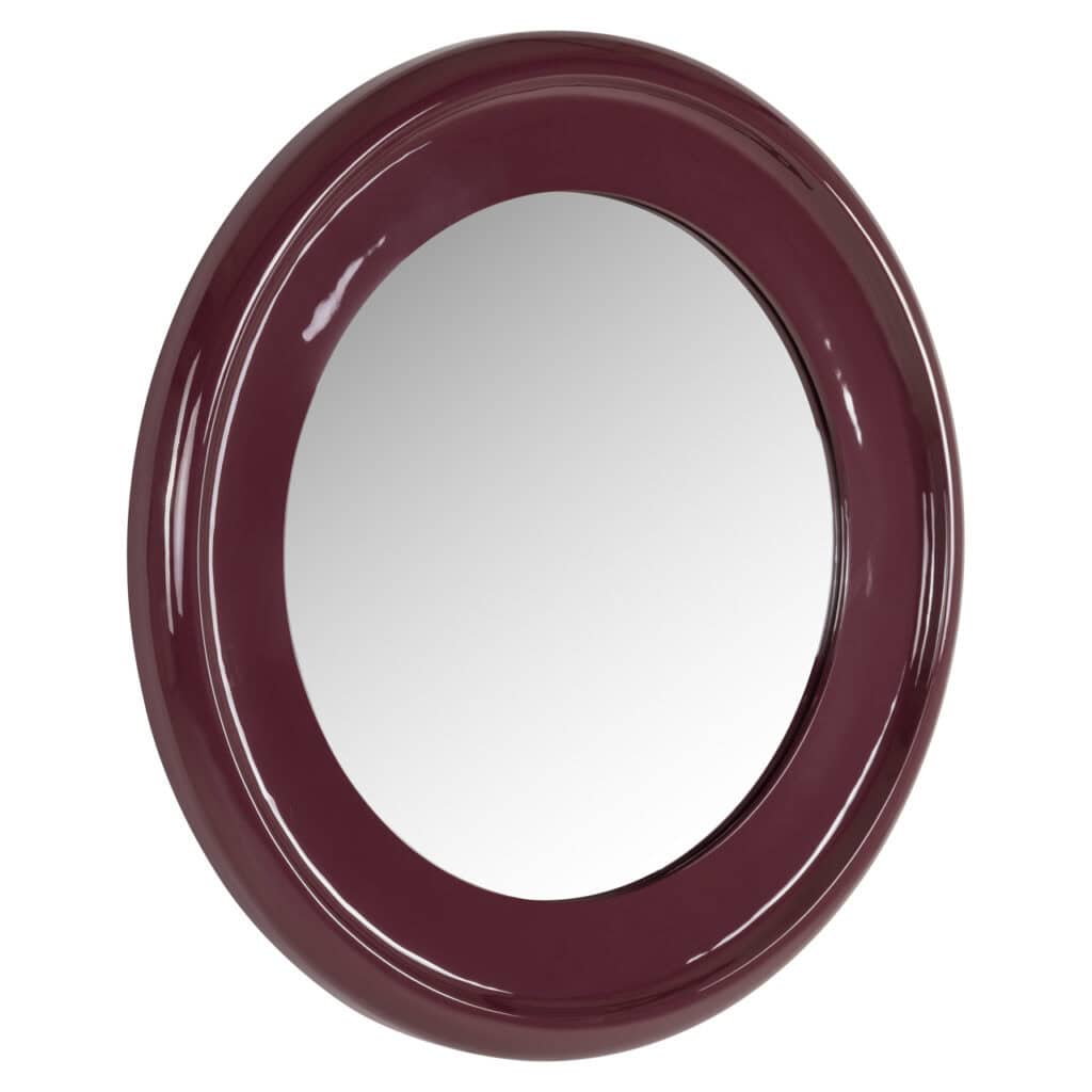 Ronde spiegel met donkerrode rand voor modern interieur.
