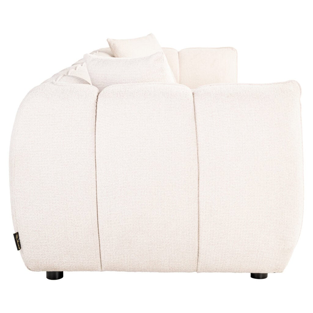 Canapé d'angle blanc luxueux avec des coussins confortables, idéal pour un intérieur moderne.