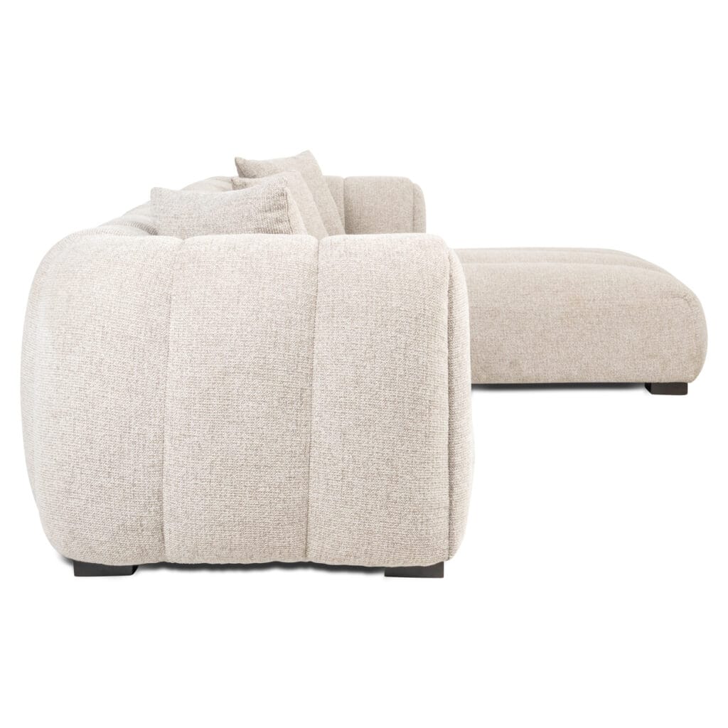 Canapé avec méridienne en tissu clair, moderne et confortable.