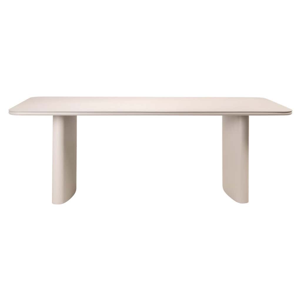 Strakke witte eettafel met uniek design, perfect voor moderne interieurs.