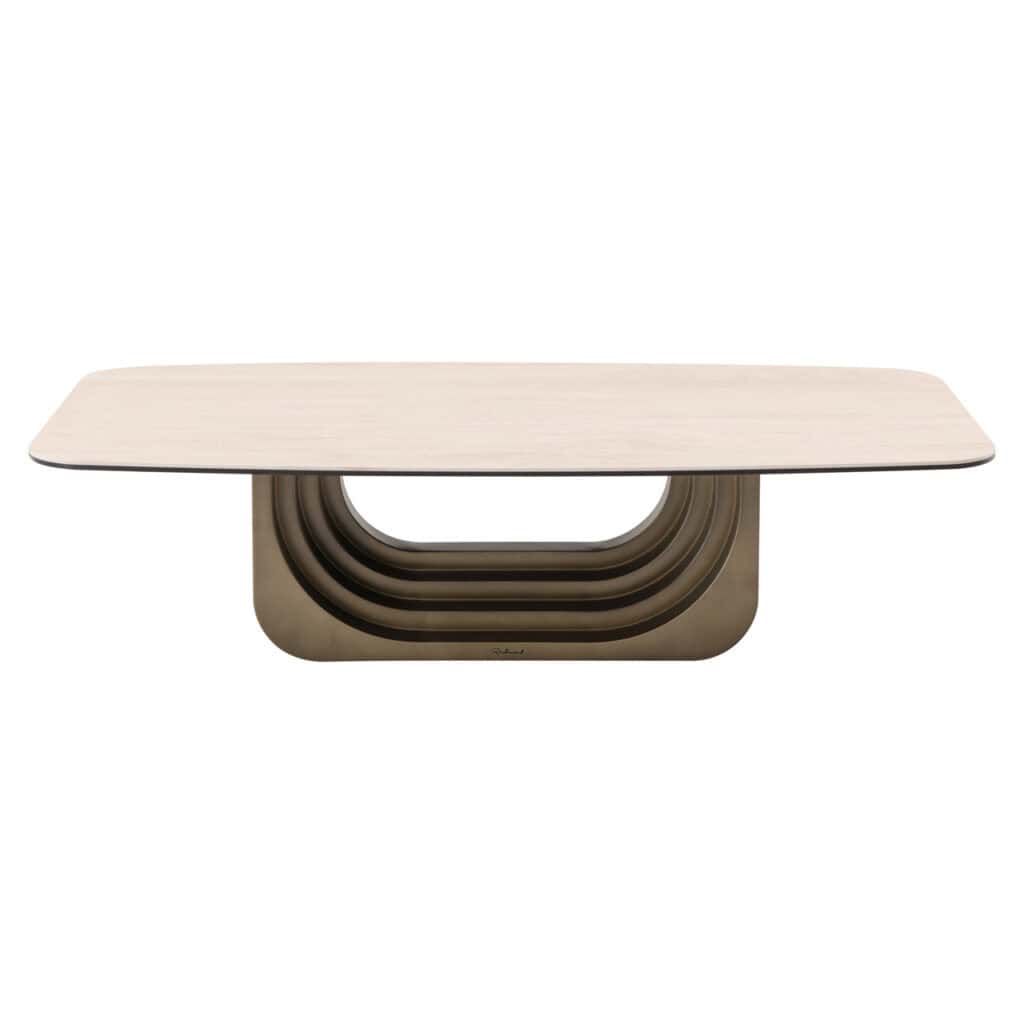 Moderne eettafel met uniek gebogen onderstel en licht houten blad, perfect voor stijlvolle eetkamers.