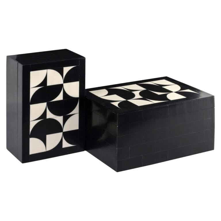 Zwart-wit geometrisch meubelset met moderne design voor stijlvolle interieurs.