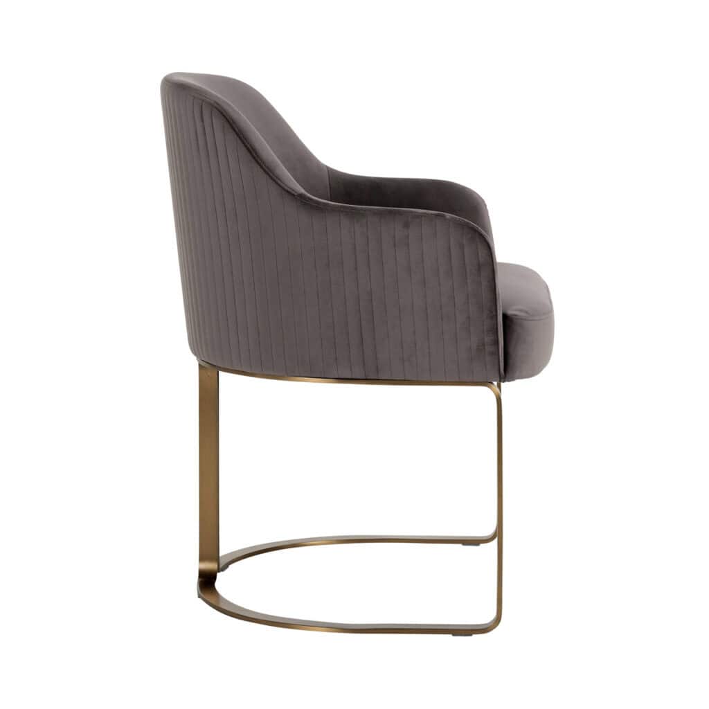 Hadley dining chair Hadley  stone velvet a gold-colored base.