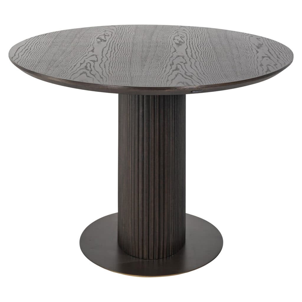 Luxor dining table Luxor brown with an oval top and round base.