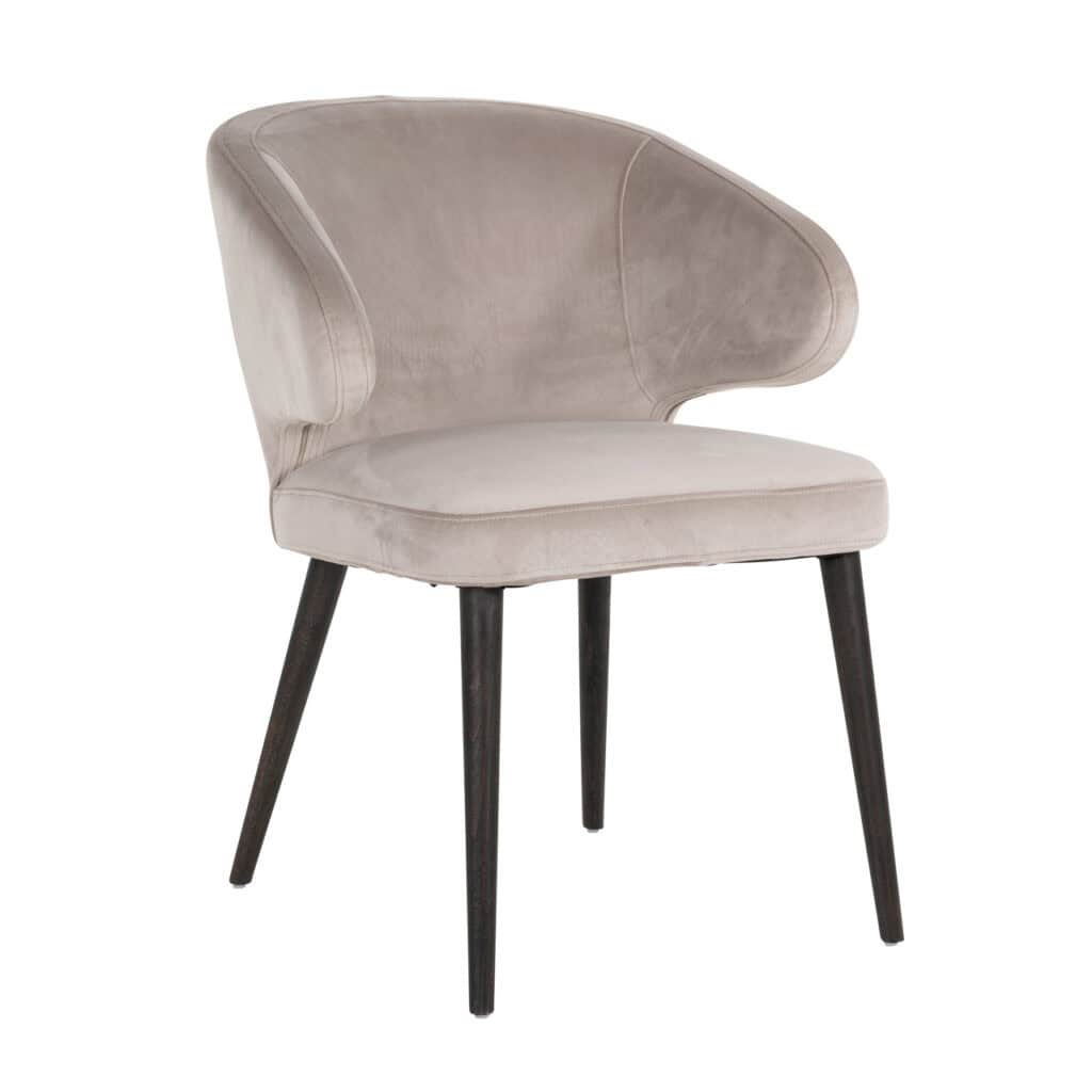 Eetkamerstoel Indigo met beige bekleding en zwarte poten.