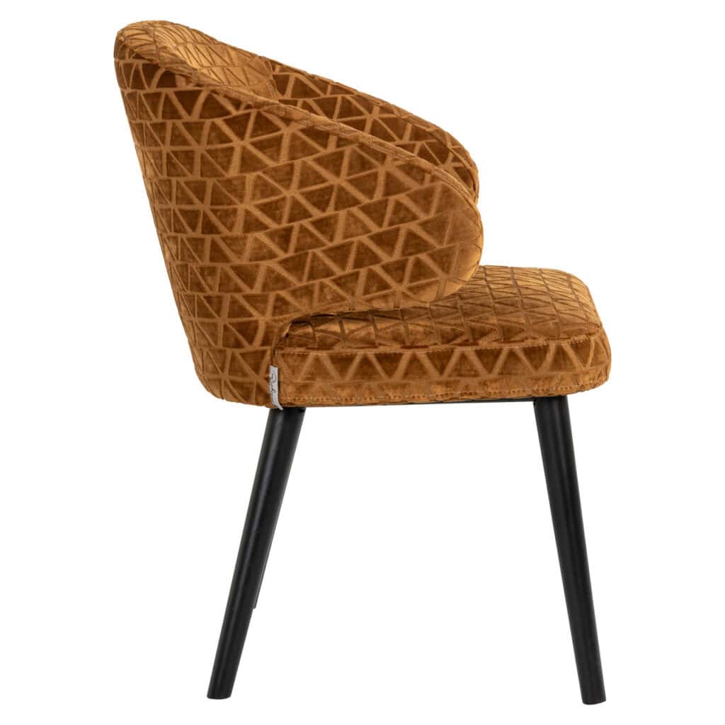Chaise de salle à manger à motifs géométriques, couleur « old gold », avec des pieds noirs.