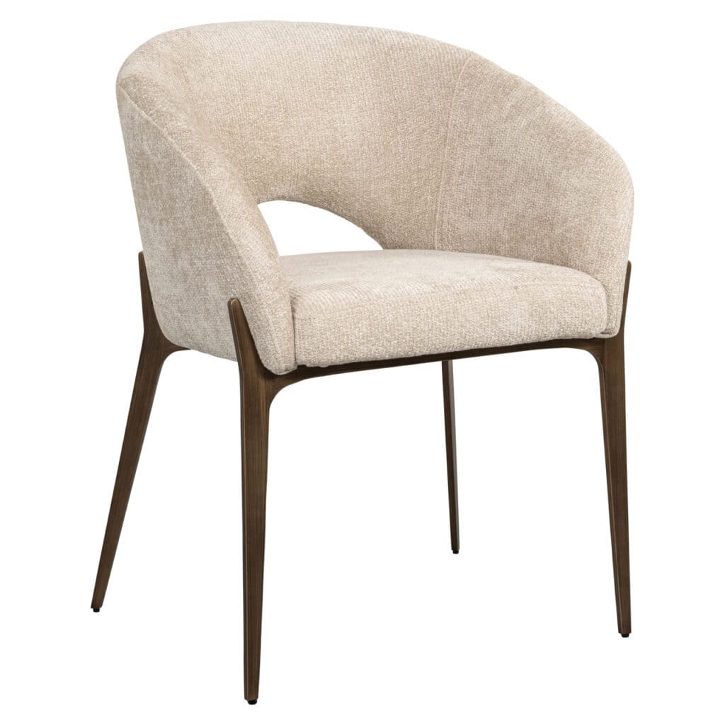 Kenzi dining chair with wooden legs and soft upholstery.