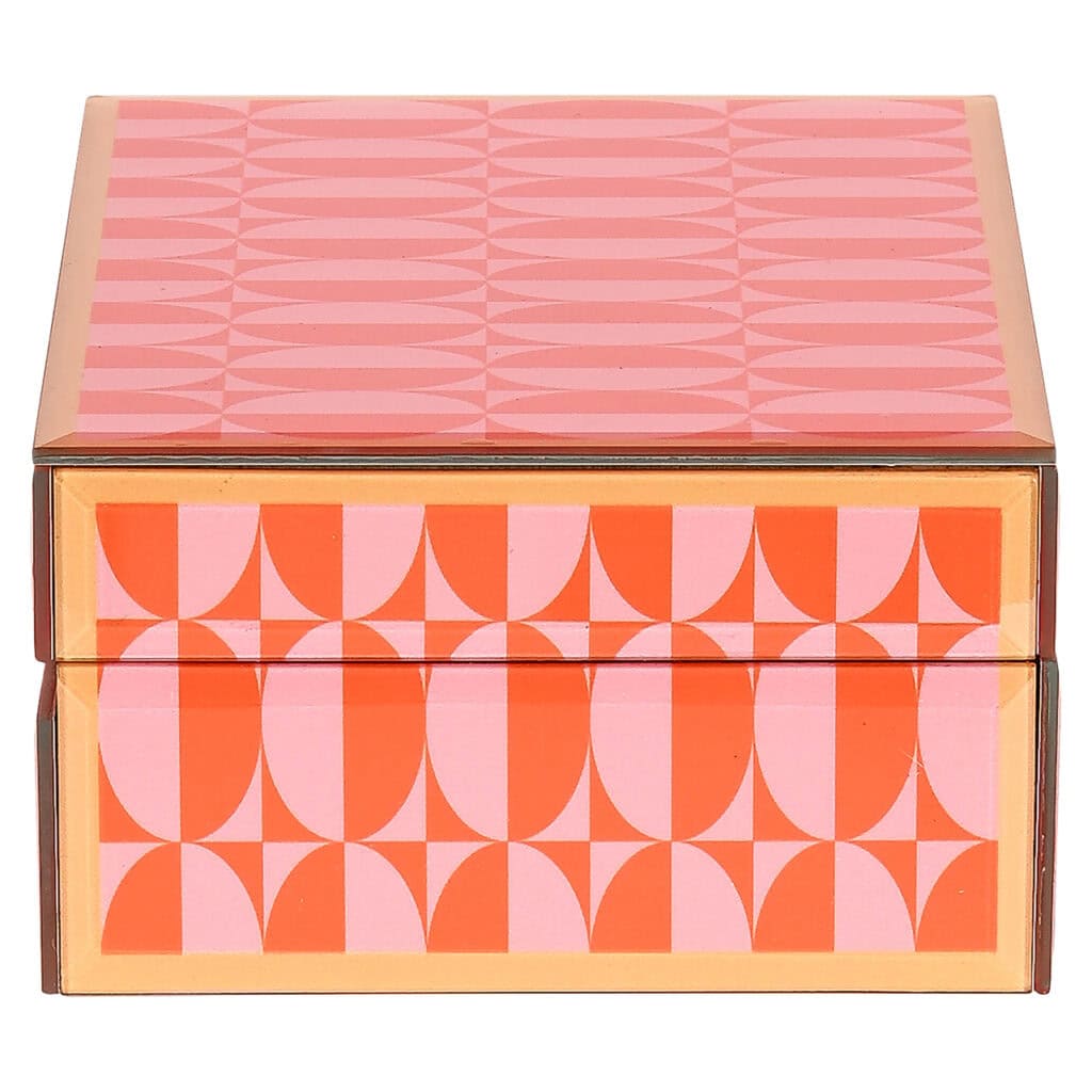 Decoratieve opbergdoos met geometrisch patroon in roze en oranje, perfect voor interieuraccessoires.