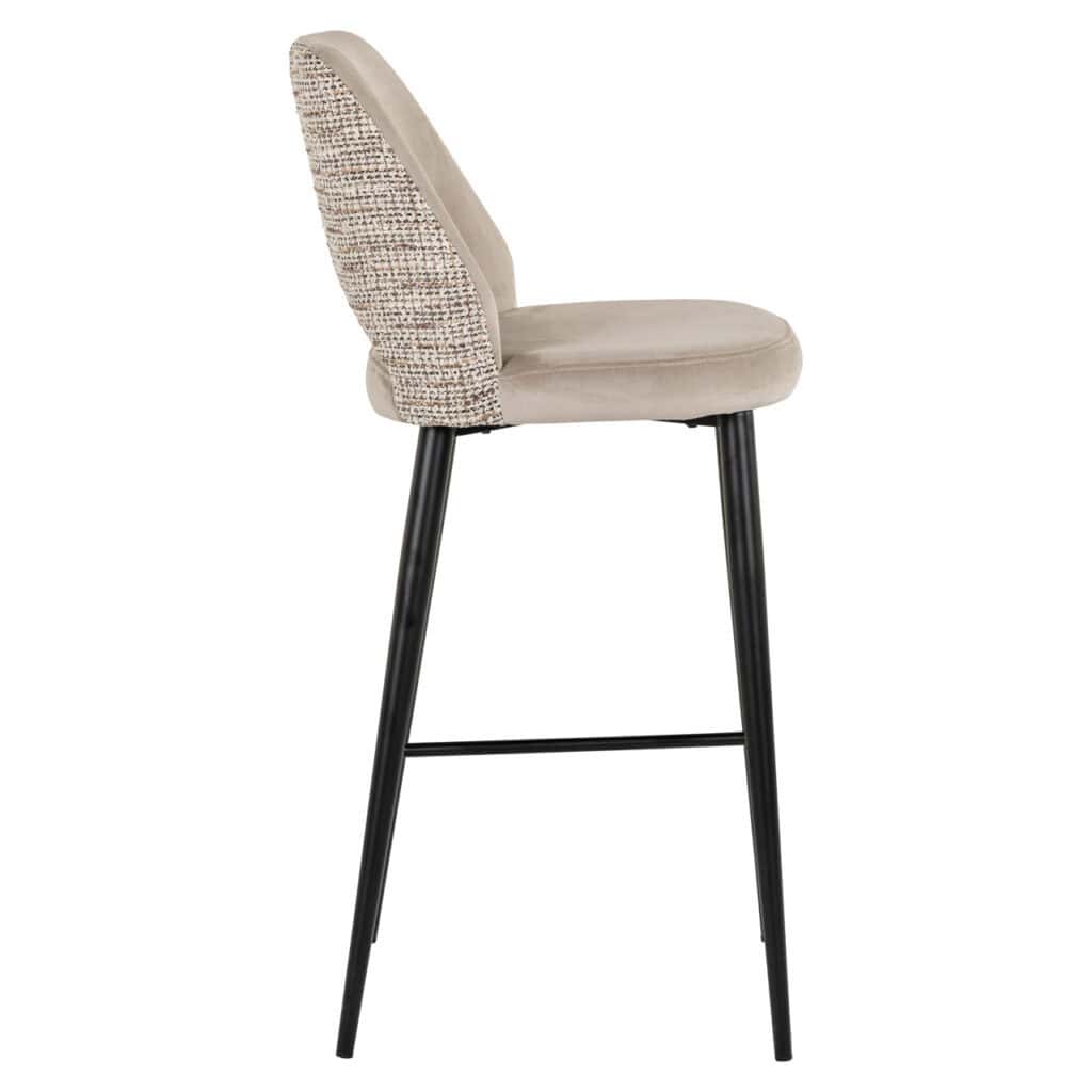 Modern bar stool with fabric upholstery and black legs for interior use.