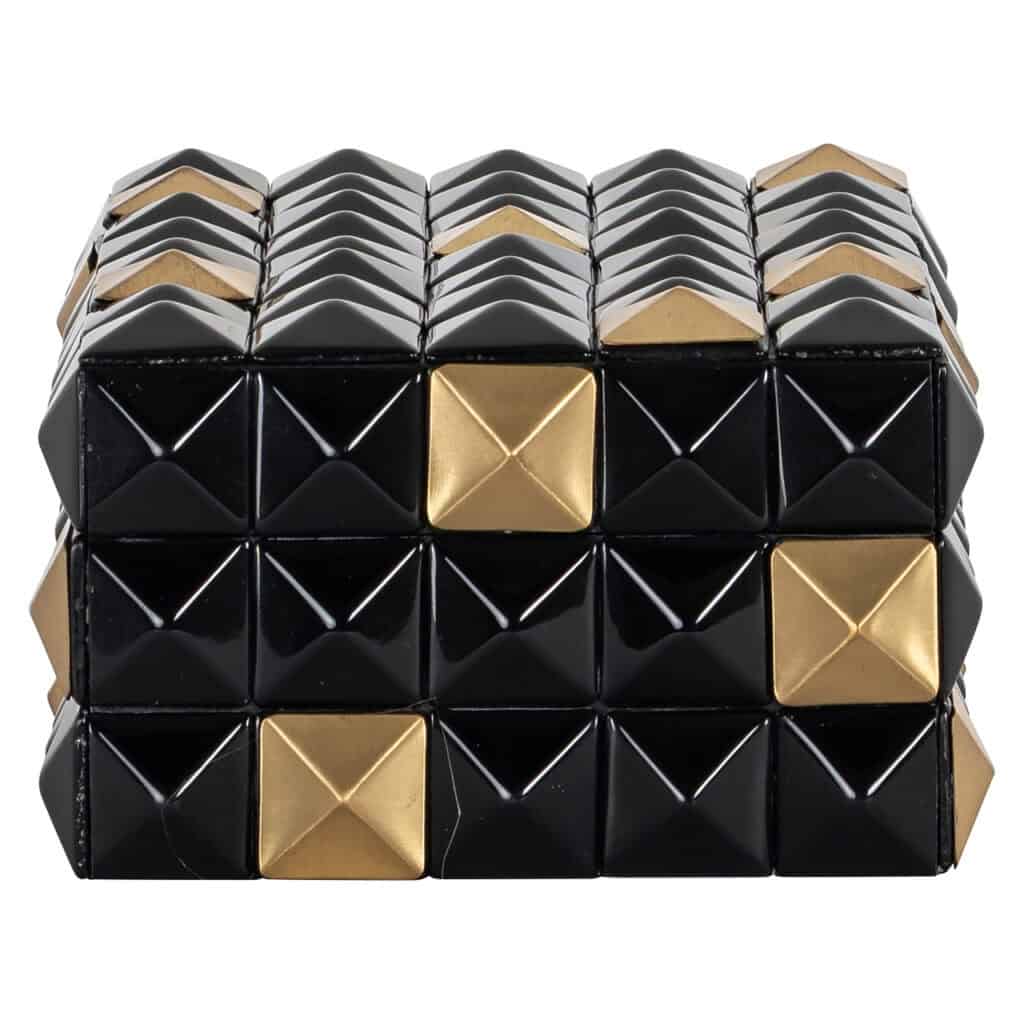 Boîte de rangement Velicia luxueuse, noire et dorée, ornée de motifs carrés et triangulaires.