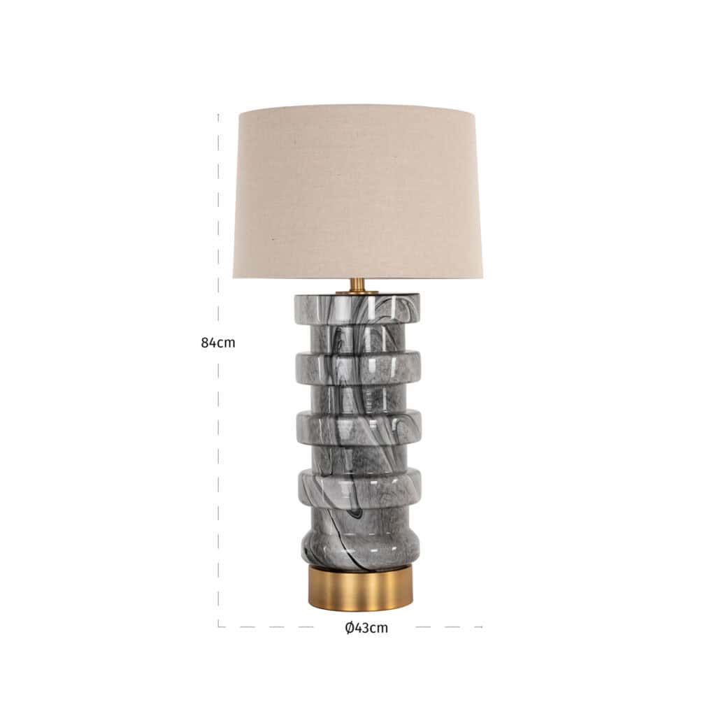 Modern Jaylee table lamp Jaylee a marble base and a beige lampshade.