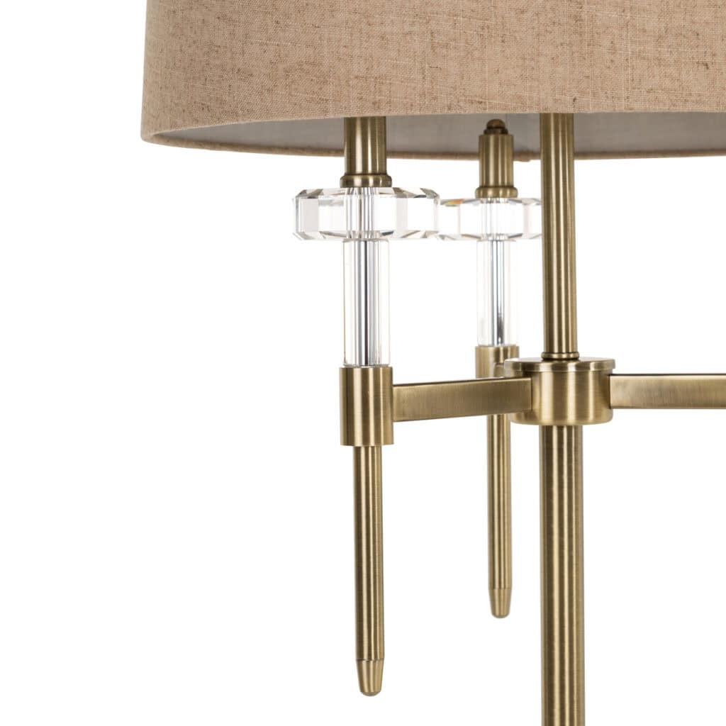 Lampadaire moderne Josie avecgold  brushed  et des détails en verre.
