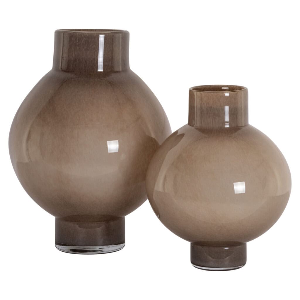 Two beige ceramic vases with a glossy finish for interior decoration.