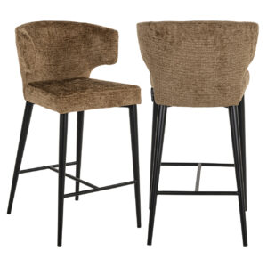 Modern bar stools with soft brown upholstery and black legs.