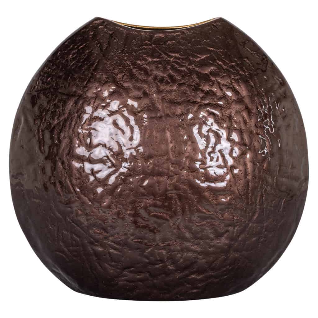 Artistic ceramic vase with a glossy, textured finish, perfect for modern interior design.