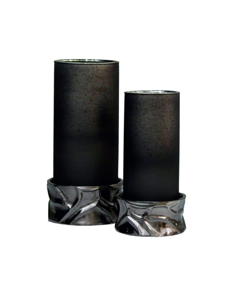 Modern black Candle holders a silver base, perfect for home decor.