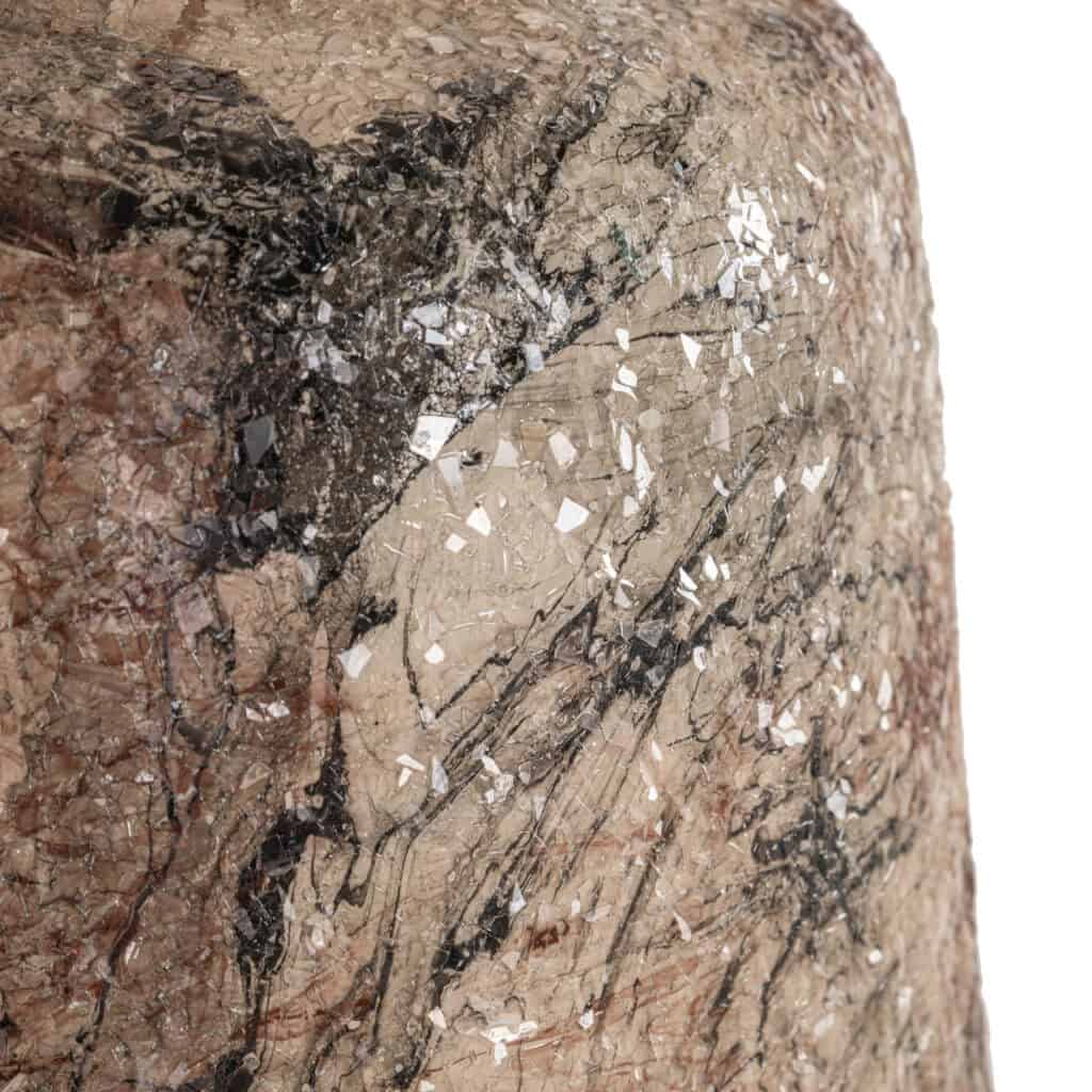Raw marble table with a natural texture and marble pattern, close-up.