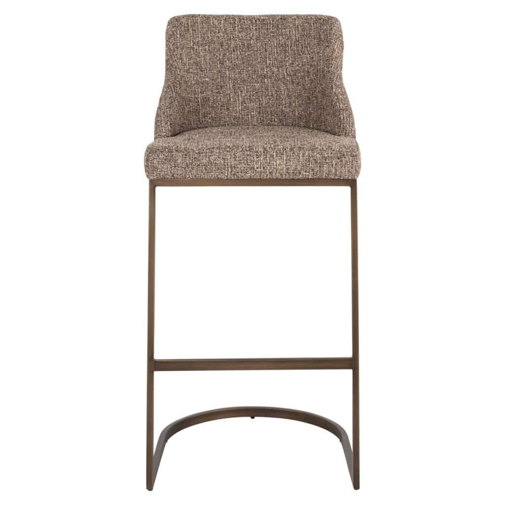 Tabouret de bar avec assise en tissu et structure métallique, idéal pour les cuisines et les bars modernes. Élégant et confortable.