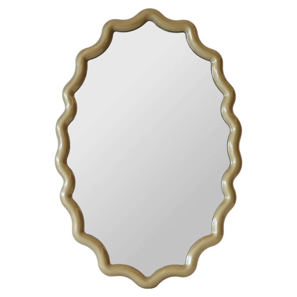 Elegant mirror with a wavy edge for stylish interior decoration.