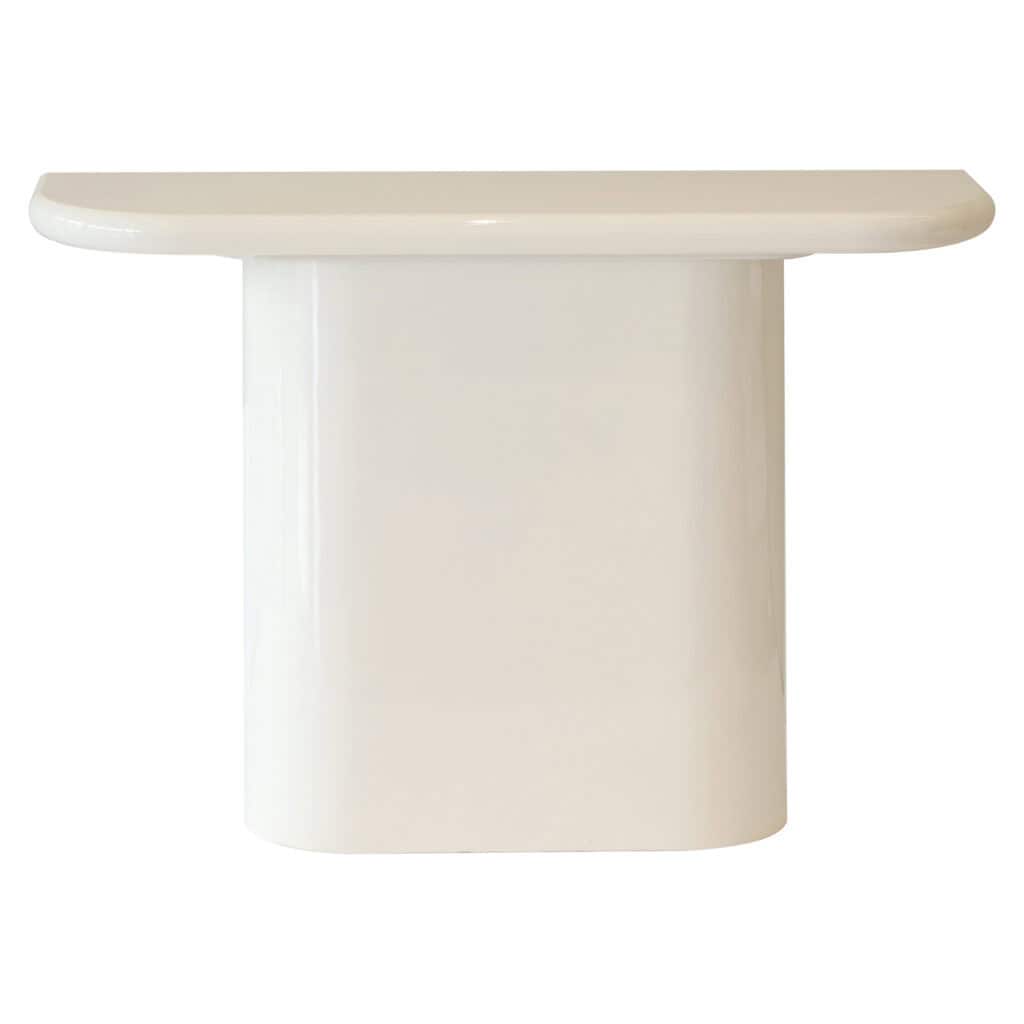 Dining table with a sleek, modern design and white finish, perfect for a contemporary interior style.