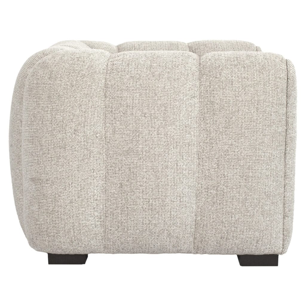 Modern fabric armchair in a light color, perfect for stylish living room interiors.