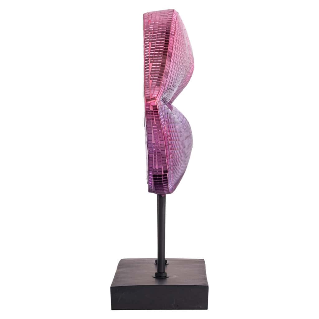 Modern, feminine sculpture with shiny pink and purple surfaces on a black base.