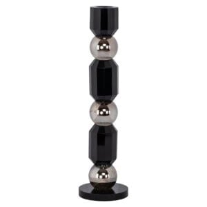 Modern decorative floor lamp with black and metallic accents for interior design.