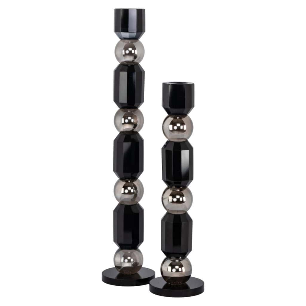 Set of decorative black and silver figurines for home decor.