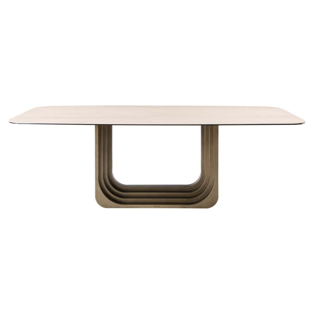 Modern beige dining table with a unique U-shaped base, perfect for stylish interiors.