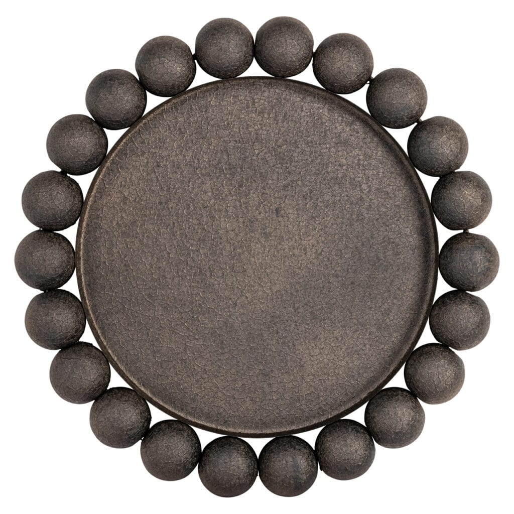Plateau rond orné de boules décoratives noires, destiné à la décoration d'intérieur.