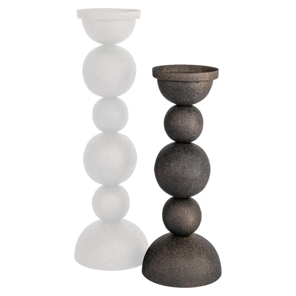 Decoratieve kandelaars set met witte en zwarte balvormige ontwerpen voor modern interieur.