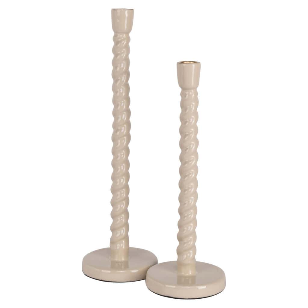 Two decorative candle holders with a twisted design in ivory white.