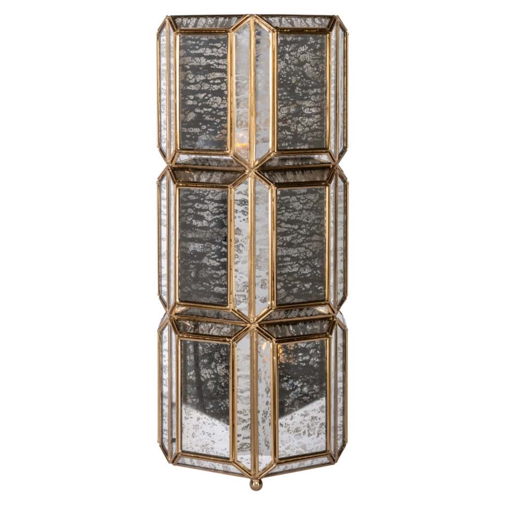 Glass cabinet with a gold-colored frame and mirrored panels, perfect for luxurious interior decoration.
