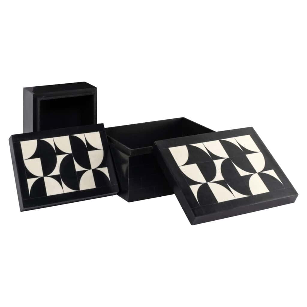 Dekorative schwarze Aufbewahrungsboxen mit geometrischem Muster, ideal für die Inneneinrichtung und zum Ordnen.