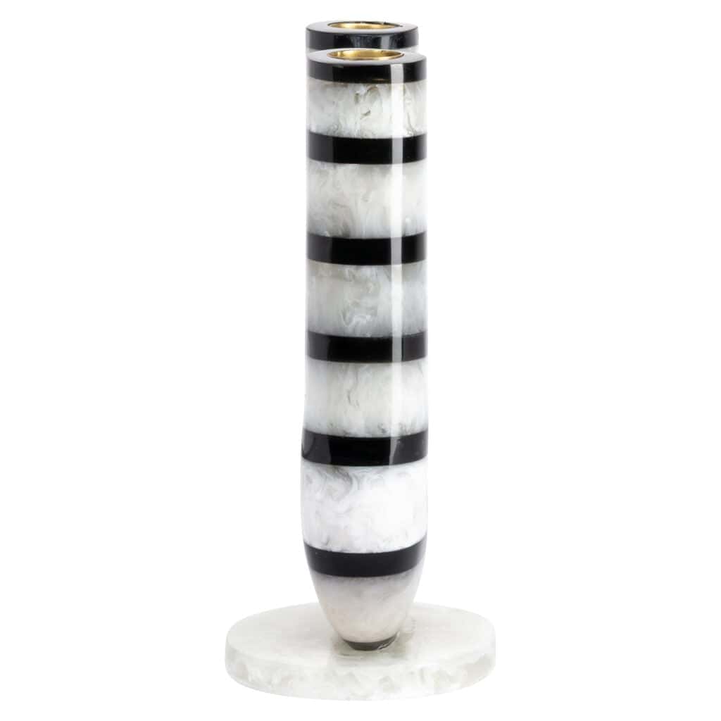 Marble vase with black-and-white stripes, modern design, decorative object.