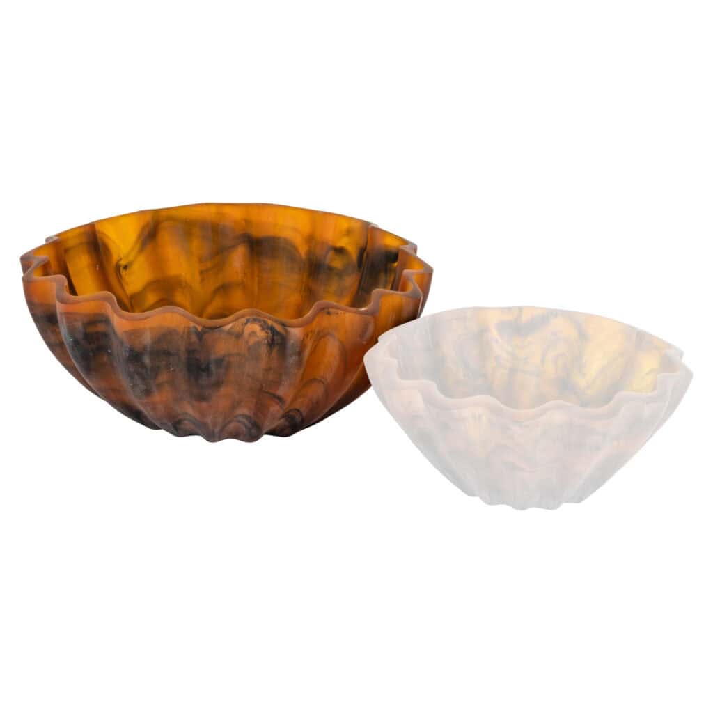 Decorative bowls made of wood and marble, perfect for interior decoration and stylish presentations.