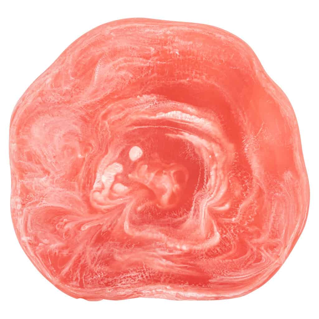 Natural salt stone block for cooking, wellness, and decoration, handmade, soothing orange-pink color.