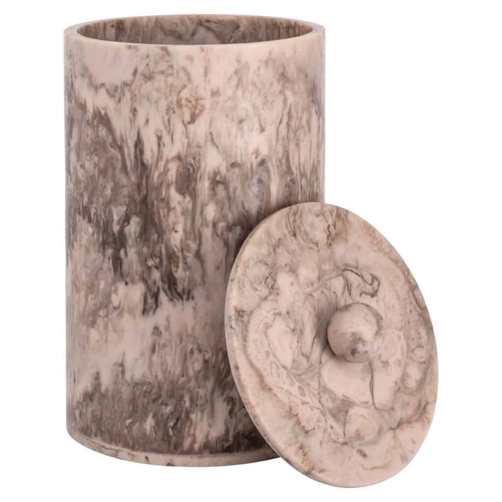 Decorative marble vase with a lid for home decor.