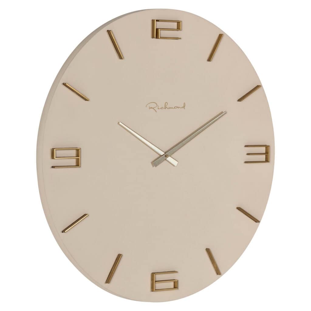 Moderne Wanduhr im minimalistischen Design mit goldenen Akzenten für eine stilvolle Inneneinrichtung.