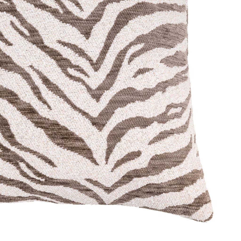 Zebra-print decorative pillow in natural colors, perfect for modern and eclectic interiors.