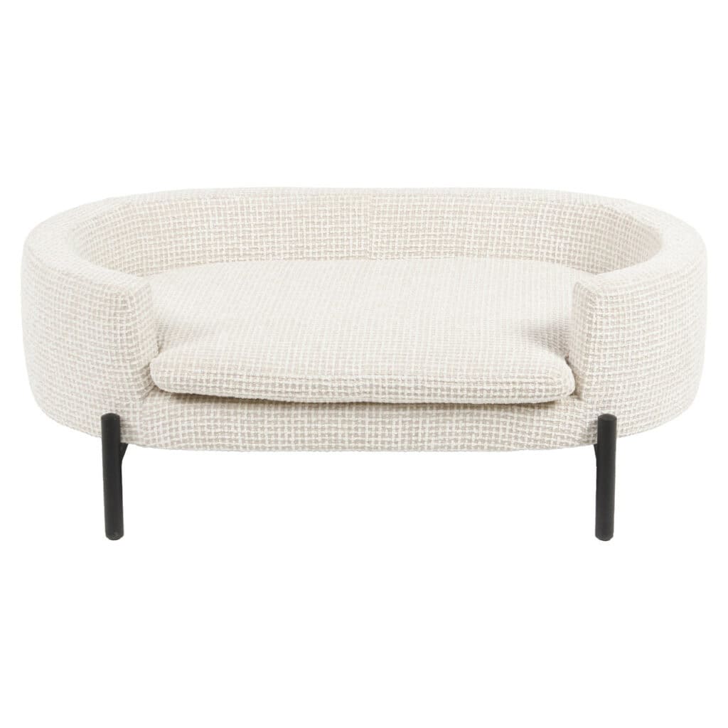 Eine Bank mit weichem, gestricktem Bezug und schwarzen Metallbeinen – perfekt für ein modernes Wohnzimmer.