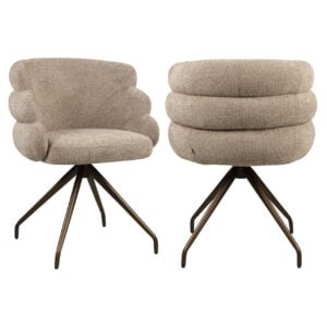 Beige armchairs with round, soft upholstery and metal legs, perfect for modern interiors.