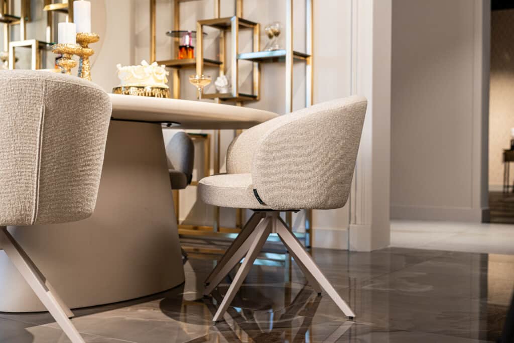 Modern beige dining chairs in a stylish interior.